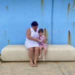 Mother and child on a bench near the sea wall on Canvey Island credit Kevin Rushby